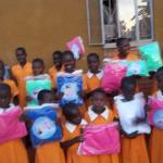 Handing out the first mosquitoes nets for children